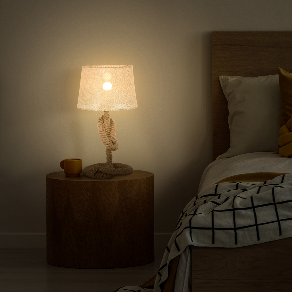 Close-up of the Aldeburgh table lamp's hemp rope and linen drum shade, highlighting the craftsmanship and material details