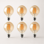 Kensington — Vintage Amber Glass G95 LED Globe Bulbs, E27 2700K, Pack of Six — product image 4