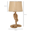 Side view of the Aldeburgh table lamp on a side table, emphasising its elegant proportions and natural fibres