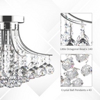 Close-up of the crystal droplets and brass accents on the Lyra petite chandelier, emphasising its premium quality