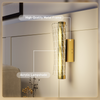 Hatton wall sconce installed in a sophisticated bedroom, providing ambient lighting with a modern aesthetic