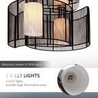 Detail shot of the Kura twin-shade ceiling light's brass fittings and matte black shades, showcasing premium materials