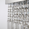 Vela modern chandelier with rectangular crystals, installed in a sophisticated hallway with ambient lighting