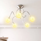 Side view of the Solace 5-Light semi-flush ceiling lamp highlighting its layered, sculptural form and brass accents