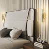 Hatton wall sconce by ZYVORAN in a stylish dining room, casting warm light and adding contemporary charm