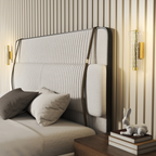 Hatton wall sconce by ZYVORAN in a stylish dining room, casting warm light and adding contemporary charm