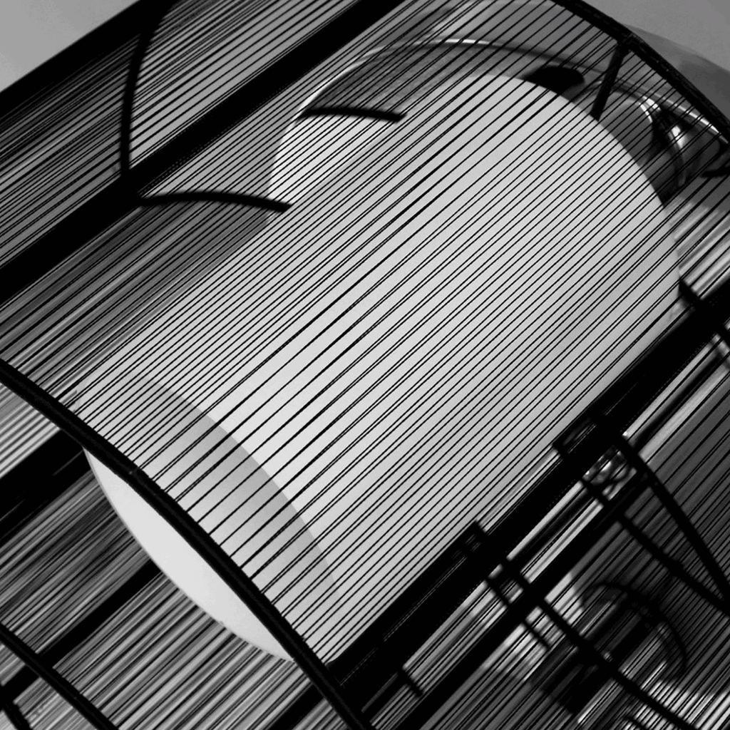 Close-up of the Kura twin-shade ceiling light's mounting mechanism and design details, emphasising quality craftsmanship