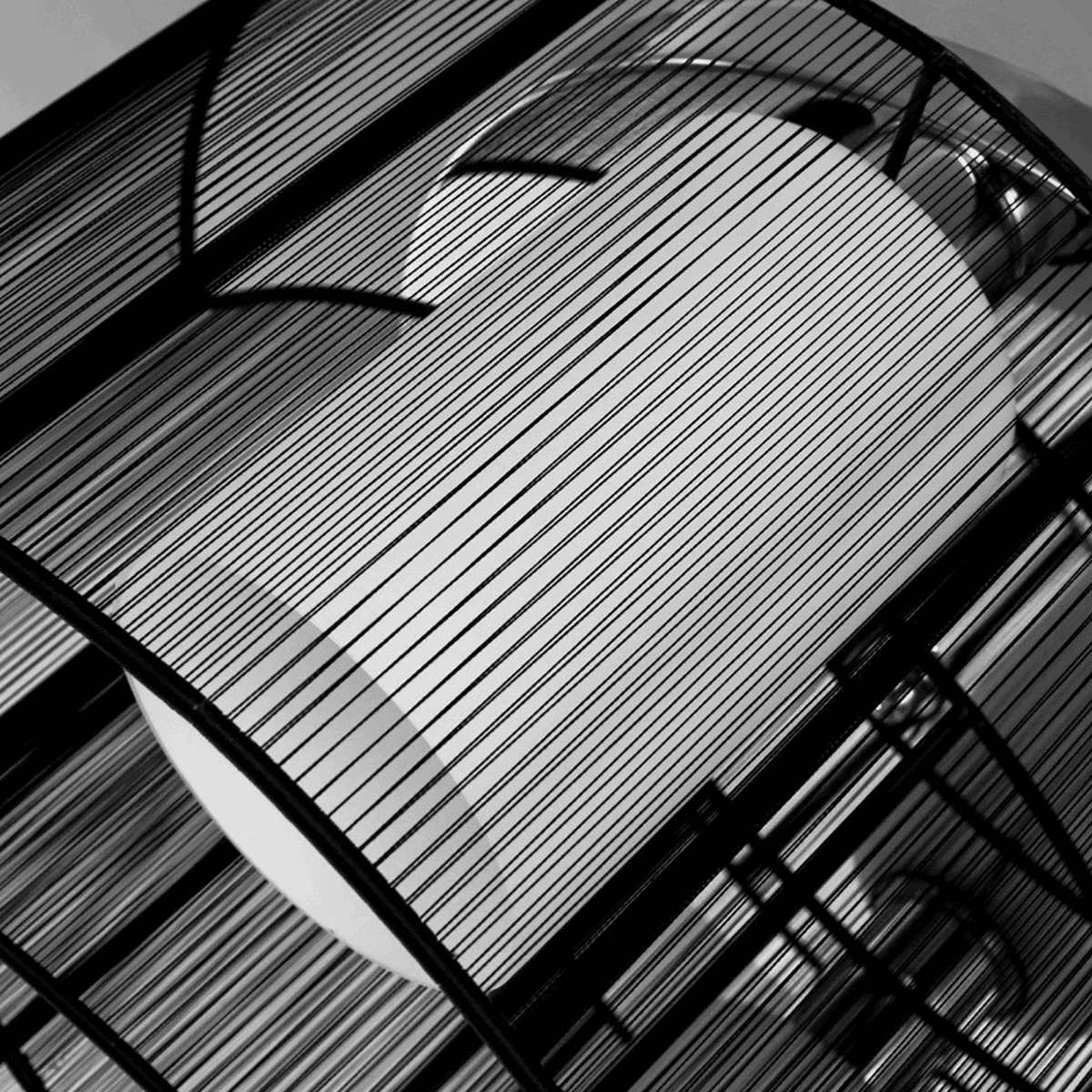 Close-up of the Kura twin-shade ceiling light's mounting mechanism and design details, emphasising quality craftsmanship