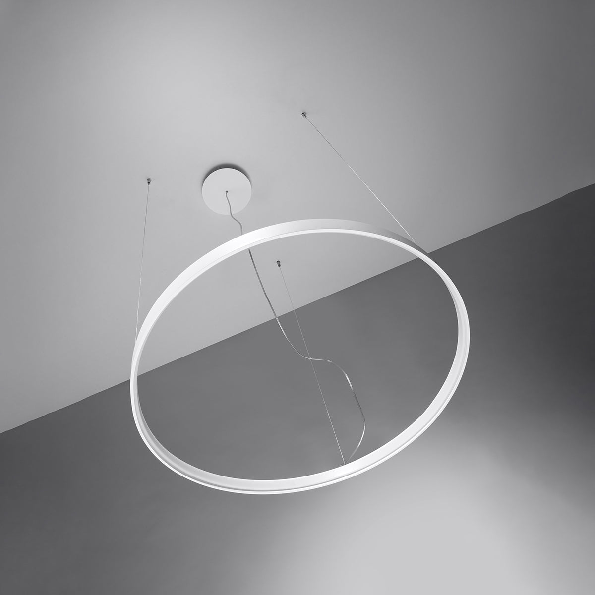 Detailed view of the single-halo LED chandelier's brushed steel construction and minimalist style
