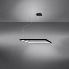 Lifestyle shot of the Meridian square halo LED pendant chandelier in a modern dining room with minimalist decor