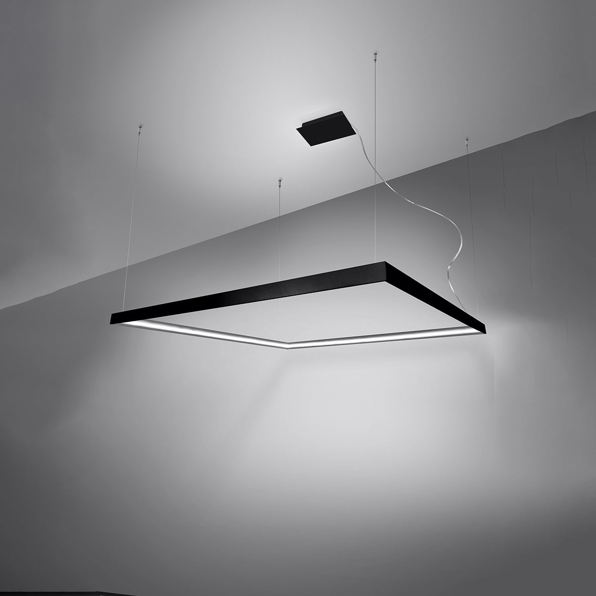 Alternative angle of the Meridian chandelier displaying the square halo LED lights and matte black frame