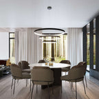 Wide shot of the Rio chandelier in a contemporary interior, highlighting its statement presence and brushed aluminium finish