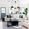 Borough 5-light spider cluster pendant chandelier in a modern living room with white sofa and black coffee table