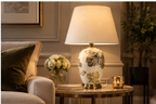 Elowen botanical ceramic table lamp styled on a living room side table