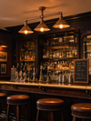 Limehouse industrial pipe ceiling light illuminating a vintage Victorian pub bar
