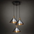 Mercer chrome and brass three-light cluster chandelier on dark studio backdrop