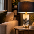 Sonning ceramic cityscape table lamp styled beside a living room sofa